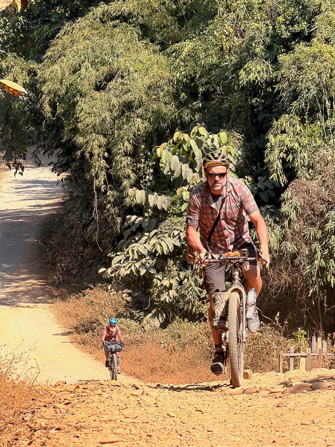 Riding through the jungle in Laos