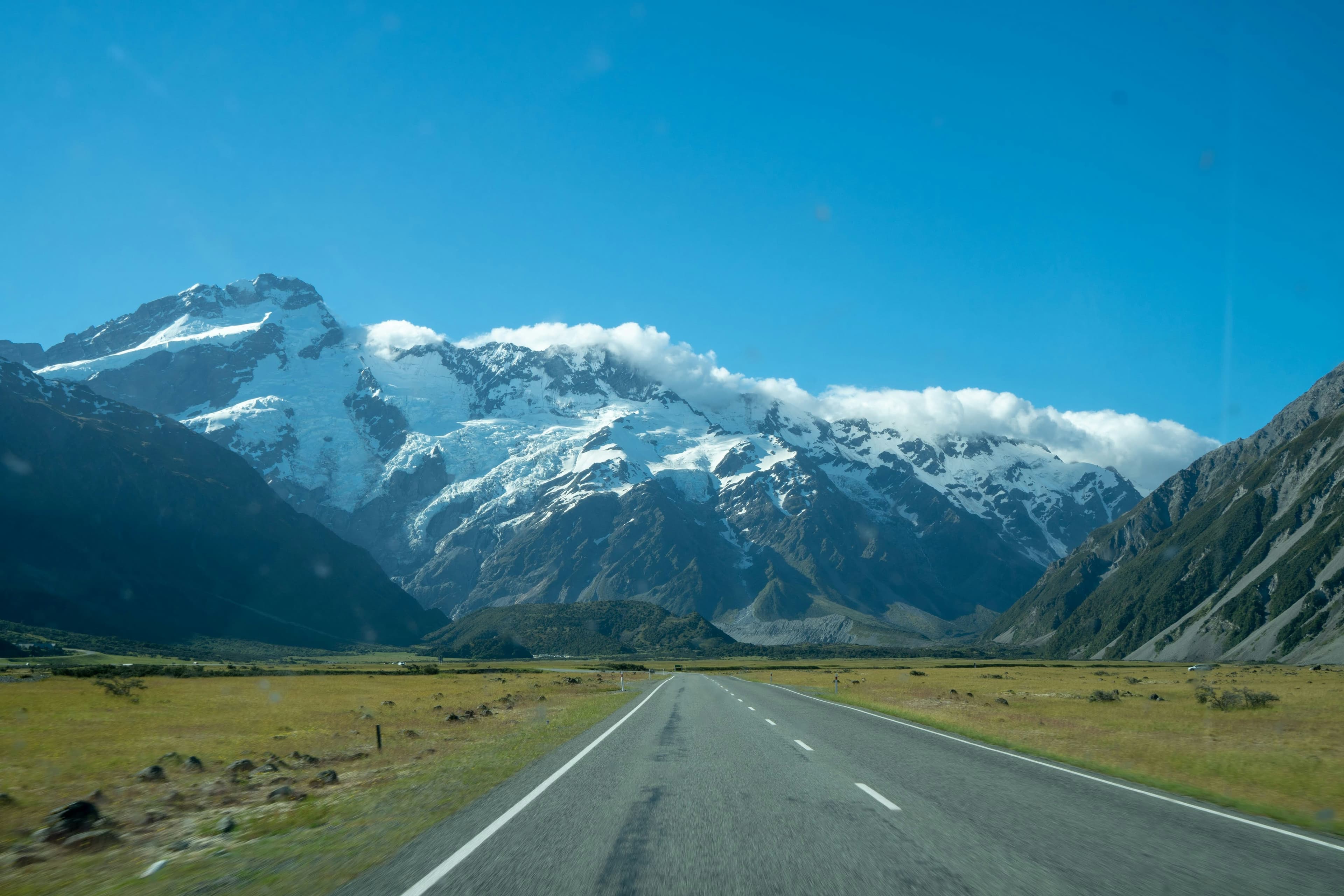 The road to Aoraki / Mount Cook — straight through the Mackenzie Basin toward the Southern Alps