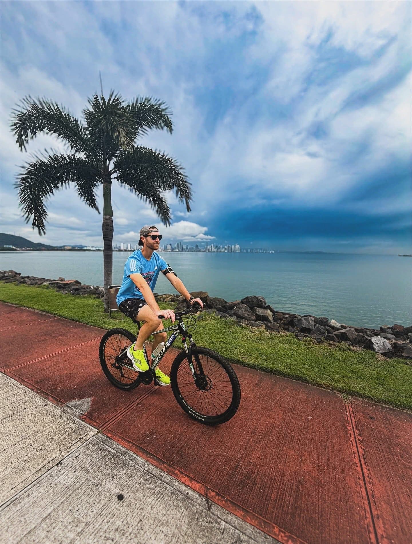 Drew riding by the coast
